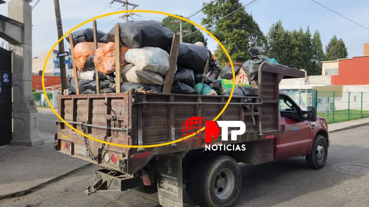 Camiones modernos de basura de San Pedro Cholula
