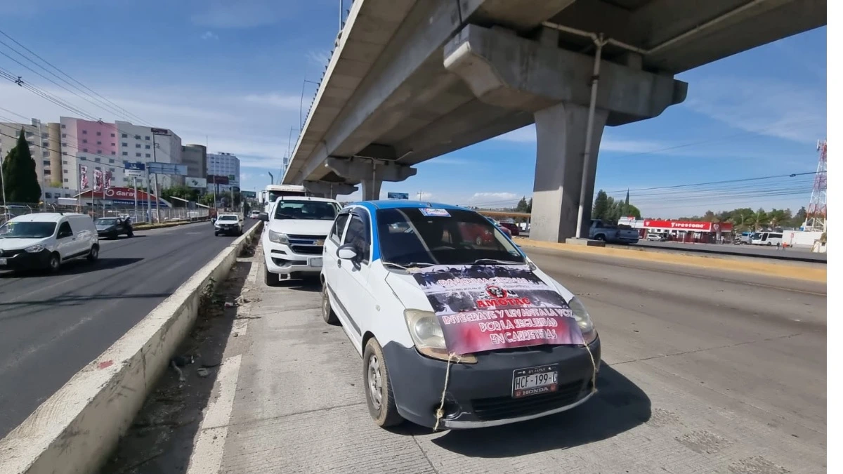 Transportistas en la autopista México-Puebla