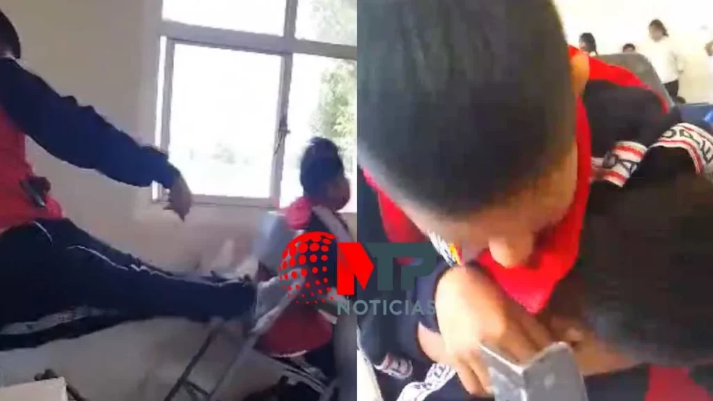 Niño patea pupitre de compañero/ otro estudiante ahorca a su compañero en secundaria de Tochtepec, Puebla.