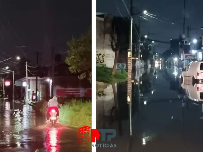 Autos atrapados en aguas negras y calles inundadas por lluvias en Ocotlán, Coronango