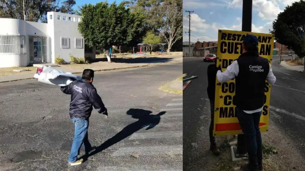 Personal del Ayuntamiento de Puebla quitando publicidad de postes por ser irregulares.